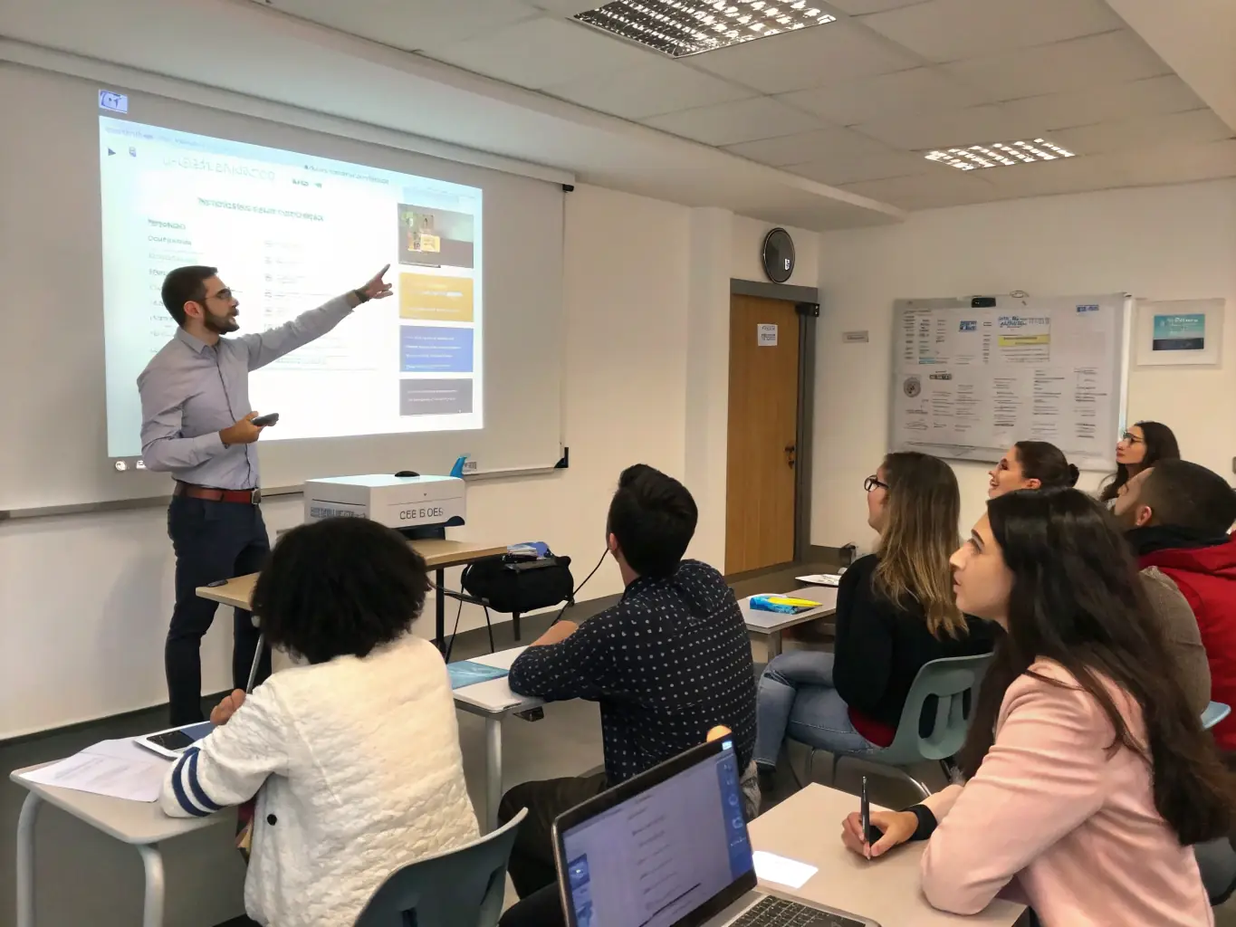An instructor leading an SAP training session, with participants actively engaged in hands-on exercises.